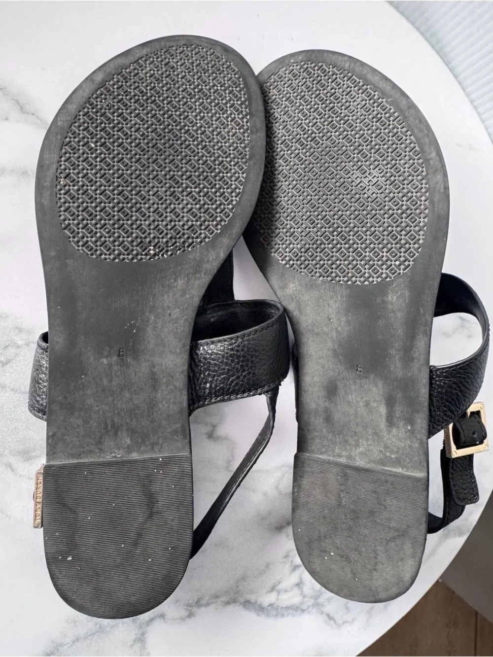 Tory Burch Black Leather Logo Thong Sandal with Gold Emblem